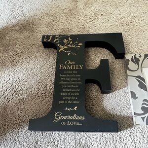 Black Decorative Letter 'F' for Family with heartfelt message.